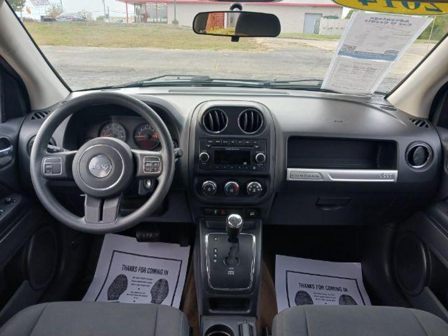 2014 Maximum Steel Metallic CC Jeep Compass Sport 4WD (1C4NJDBB5ED) with an 2.4L L4 DOHC 16V engine, located at 4508 South Dixie Dr, Moraine, OH, 45439, (937) 908-9800, 39.689976, -84.218452 - Photo#7