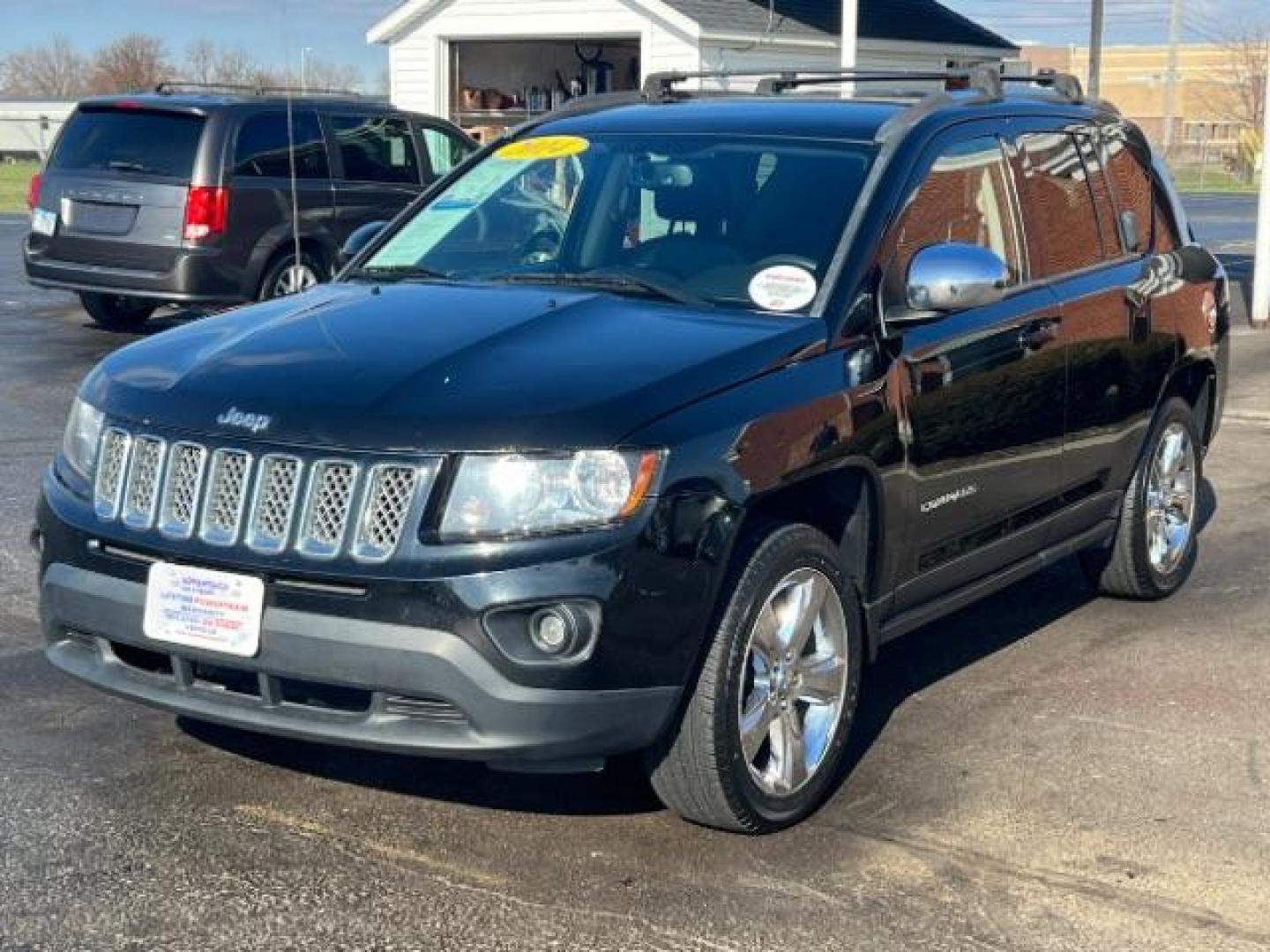 2014 Black Clearcoat Jeep Compass Latitude 4WD (1C4NJDEB5ED) with an 2.4L L4 DOHC 16V engine, Continuously Variable Transmission transmission, located at 1099 N County Rd 25A, Troy, OH, 45373, (937) 908-9800, 40.057079, -84.212883 - Photo#2