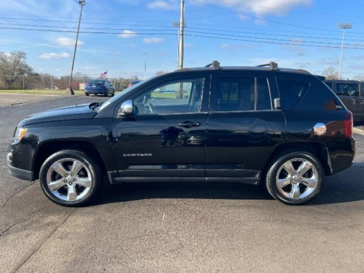 2014 Black Clearcoat Jeep Compass Latitude 4WD (1C4NJDEB5ED) with an 2.4L L4 DOHC 16V engine, Continuously Variable Transmission transmission, located at 1099 N County Rd 25A, Troy, OH, 45373, (937) 908-9800, 40.057079, -84.212883 - Photo#3