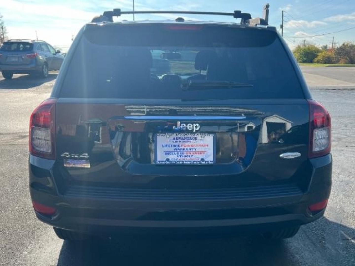 2014 Black Clearcoat Jeep Compass Latitude 4WD (1C4NJDEB5ED) with an 2.4L L4 DOHC 16V engine, Continuously Variable Transmission transmission, located at 1099 N County Rd 25A, Troy, OH, 45373, (937) 908-9800, 40.057079, -84.212883 - Photo#4