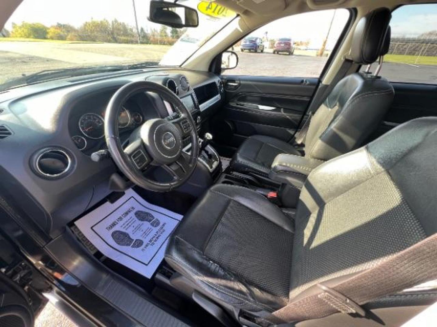 2014 Black Clearcoat Jeep Compass Latitude 4WD (1C4NJDEB5ED) with an 2.4L L4 DOHC 16V engine, Continuously Variable Transmission transmission, located at 1099 N County Rd 25A, Troy, OH, 45373, (937) 908-9800, 40.057079, -84.212883 - Photo#6