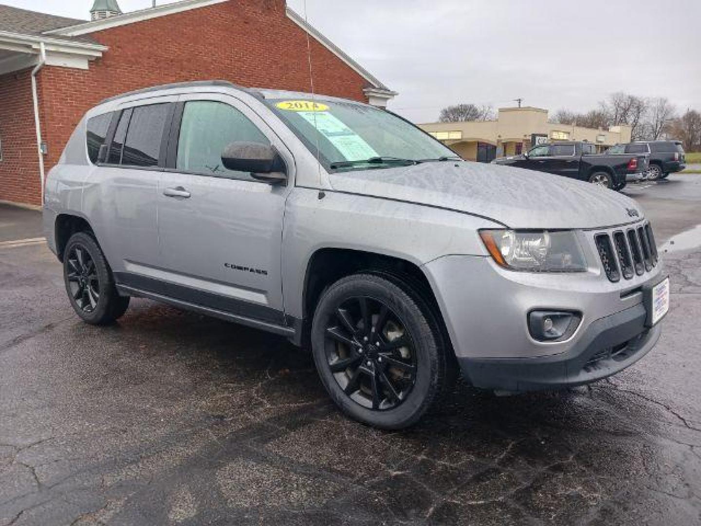 2014 Bright Silver Metallic CC Jeep Compass Sport FWD (1C4NJCBAXED) with an 2.0L L4 DOHC 16V engine, located at 1099 N County Rd 25A, Troy, OH, 45373, (937) 908-9800, 40.057079, -84.212883 - Photo#0