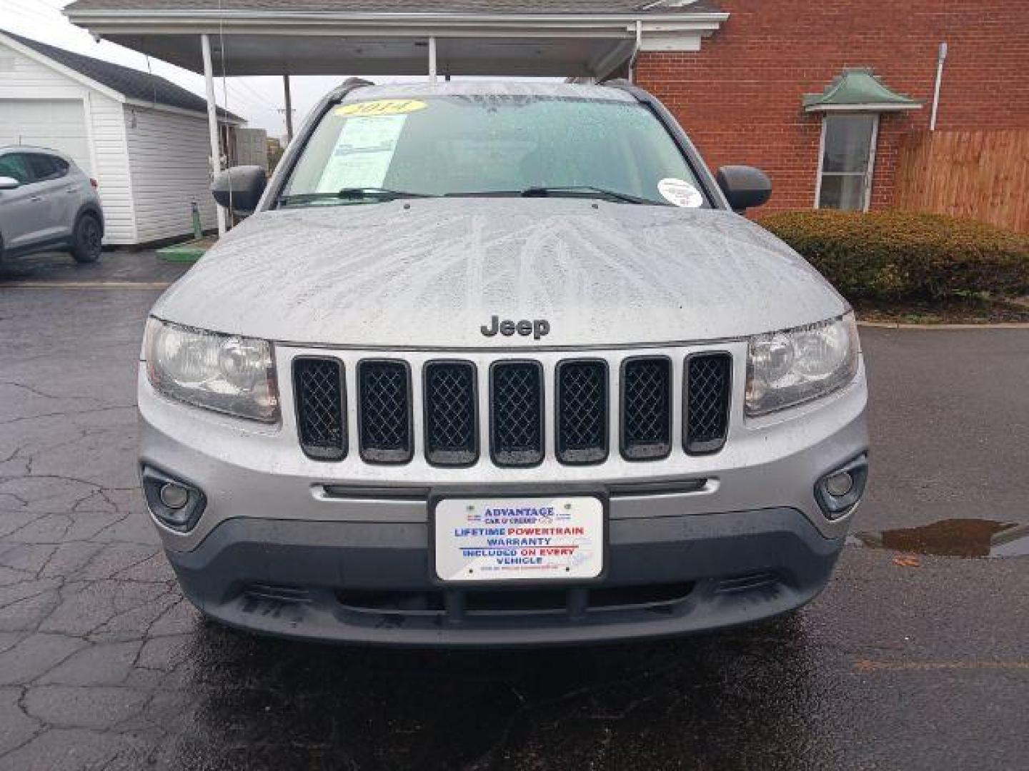 2014 Bright Silver Metallic CC Jeep Compass Sport FWD (1C4NJCBAXED) with an 2.0L L4 DOHC 16V engine, located at 1099 N County Rd 25A, Troy, OH, 45373, (937) 908-9800, 40.057079, -84.212883 - Photo#1