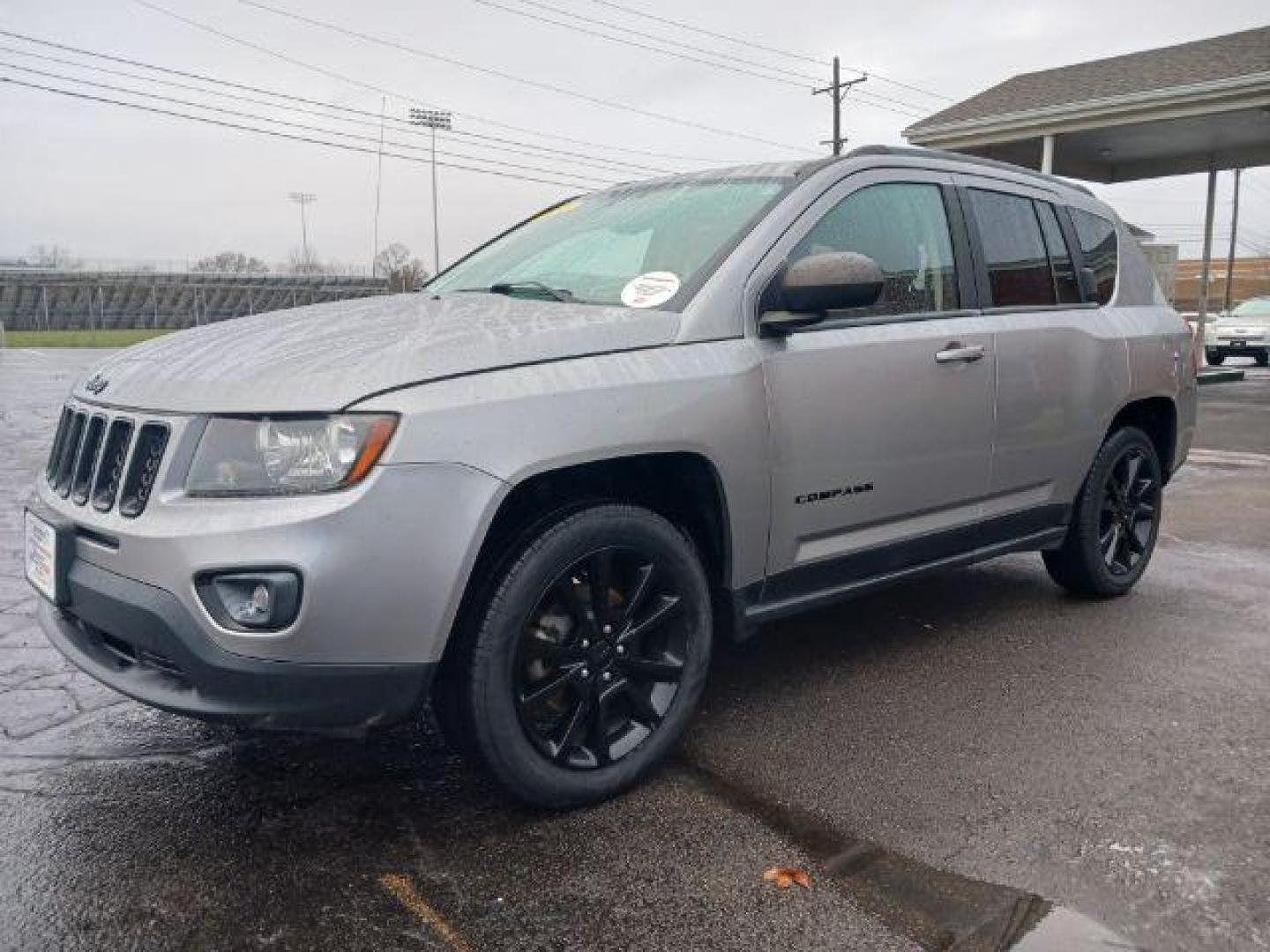 2014 Bright Silver Metallic CC Jeep Compass Sport FWD (1C4NJCBAXED) with an 2.0L L4 DOHC 16V engine, located at 1099 N County Rd 25A, Troy, OH, 45373, (937) 908-9800, 40.057079, -84.212883 - Photo#2