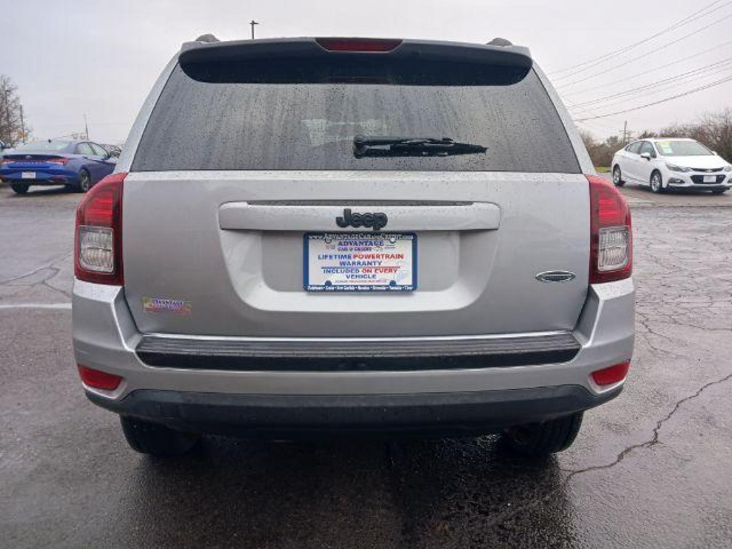 2014 Bright Silver Metallic CC Jeep Compass Sport FWD (1C4NJCBAXED) with an 2.0L L4 DOHC 16V engine, located at 1099 N County Rd 25A, Troy, OH, 45373, (937) 908-9800, 40.057079, -84.212883 - Photo#5