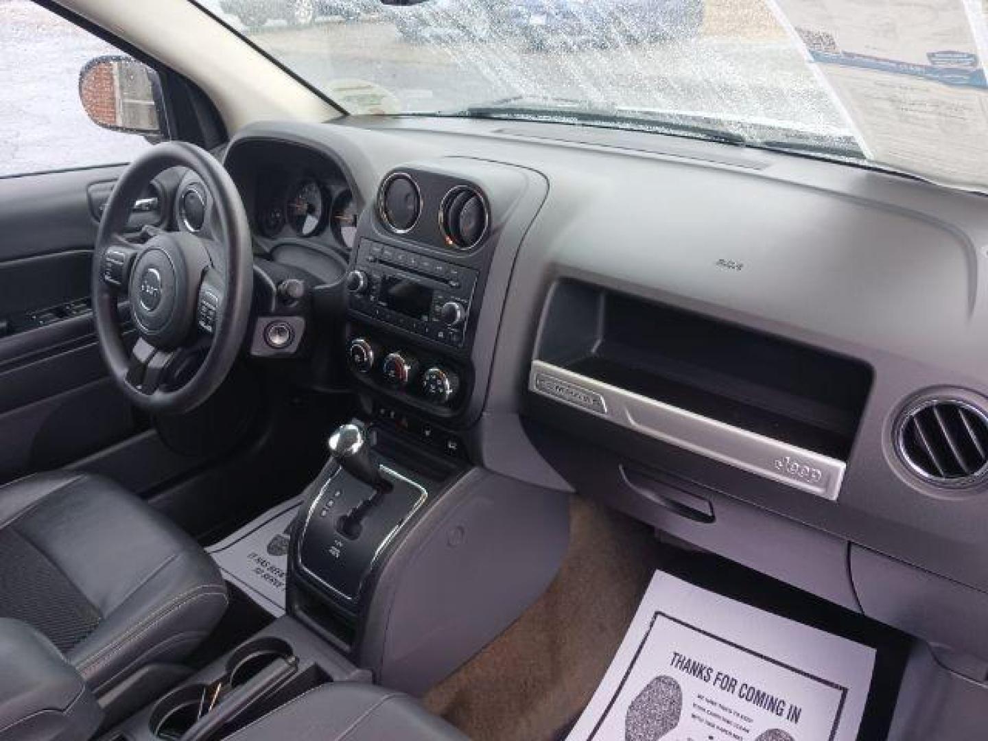 2014 Bright Silver Metallic CC Jeep Compass Sport FWD (1C4NJCBAXED) with an 2.0L L4 DOHC 16V engine, located at 1099 N County Rd 25A, Troy, OH, 45373, (937) 908-9800, 40.057079, -84.212883 - Photo#8