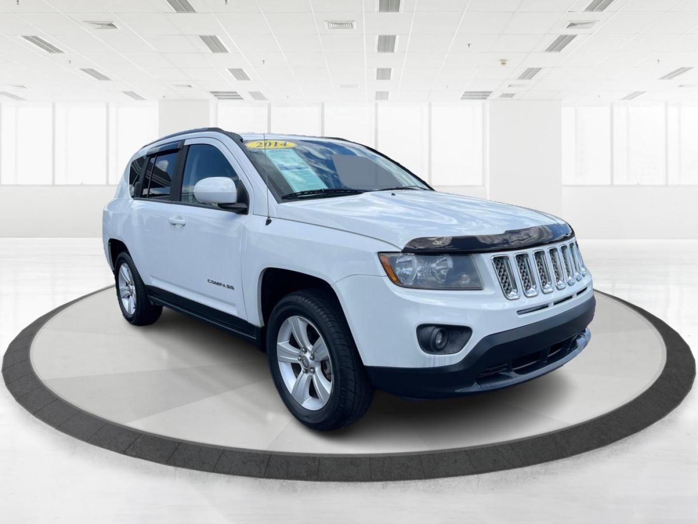 2014 Bright White Clearcoat Jeep Compass Latitude 4WD (1C4NJDEB8ED) with an 2.4L L4 DOHC 16V engine, Continuously Variable Transmission transmission, located at 1099 N County Rd 25A, Troy, OH, 45373, (937) 908-9800, 40.057079, -84.212883 - Photo#0