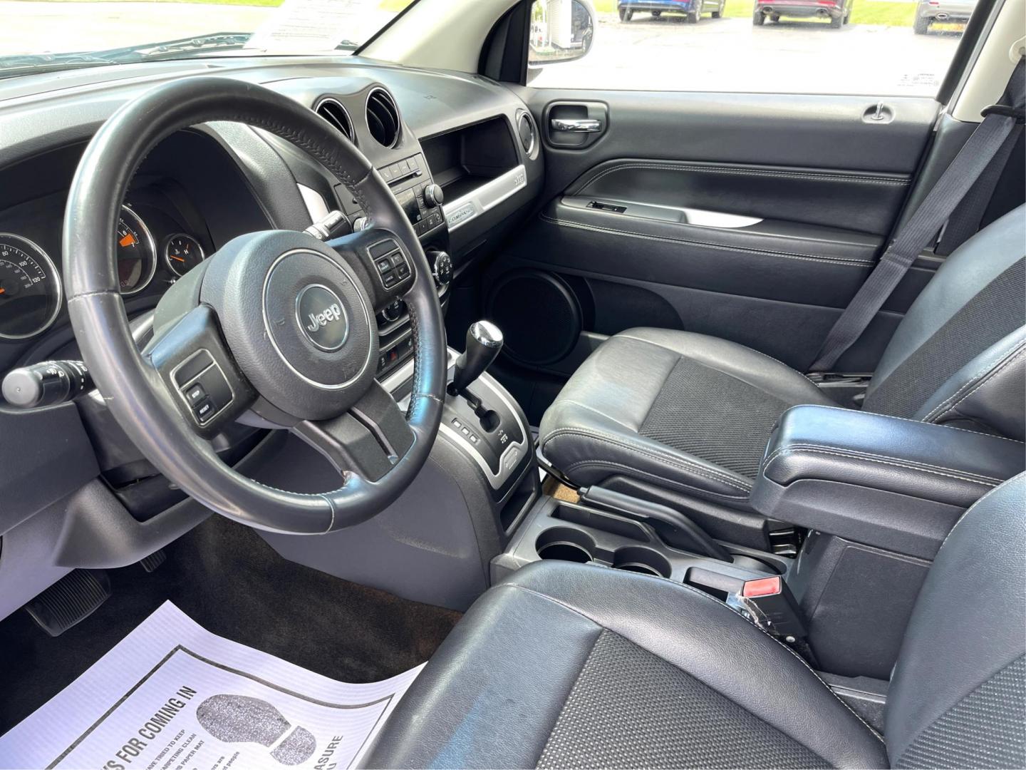 2014 Bright White Clearcoat Jeep Compass Latitude 4WD (1C4NJDEB8ED) with an 2.4L L4 DOHC 16V engine, Continuously Variable Transmission transmission, located at 1099 N County Rd 25A, Troy, OH, 45373, (937) 908-9800, 40.057079, -84.212883 - Photo#8