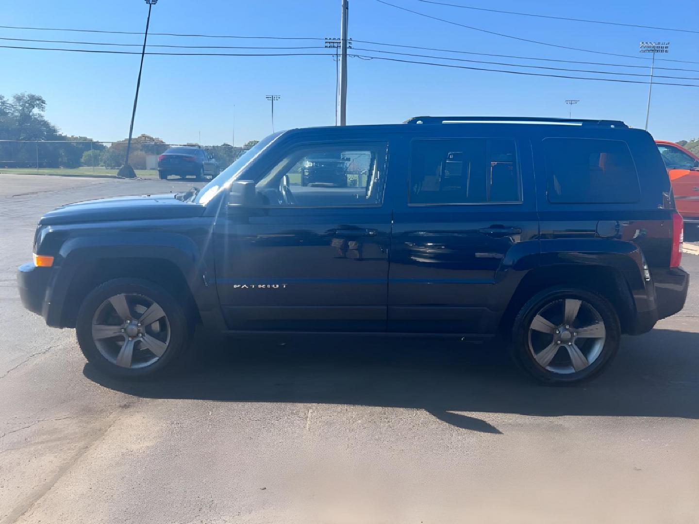 2014 True Blue Pearlcoat Jeep Patriot (1C4NJPFA6ED) with an 2.0L L4 DOHC 16V engine, located at 1951 S Dayton Lakeview Rd., New Carlisle, OH, 45344, (937) 908-9800, 39.890999, -84.050255 - Photo#4