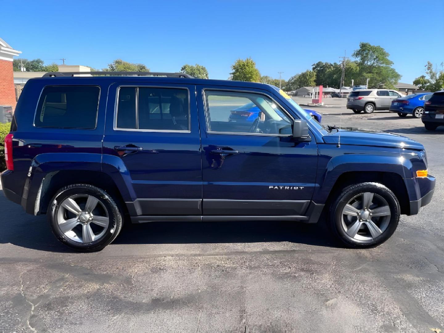 2014 True Blue Pearlcoat Jeep Patriot (1C4NJPFA6ED) with an 2.0L L4 DOHC 16V engine, located at 1951 S Dayton Lakeview Rd., New Carlisle, OH, 45344, (937) 908-9800, 39.890999, -84.050255 - Photo#5