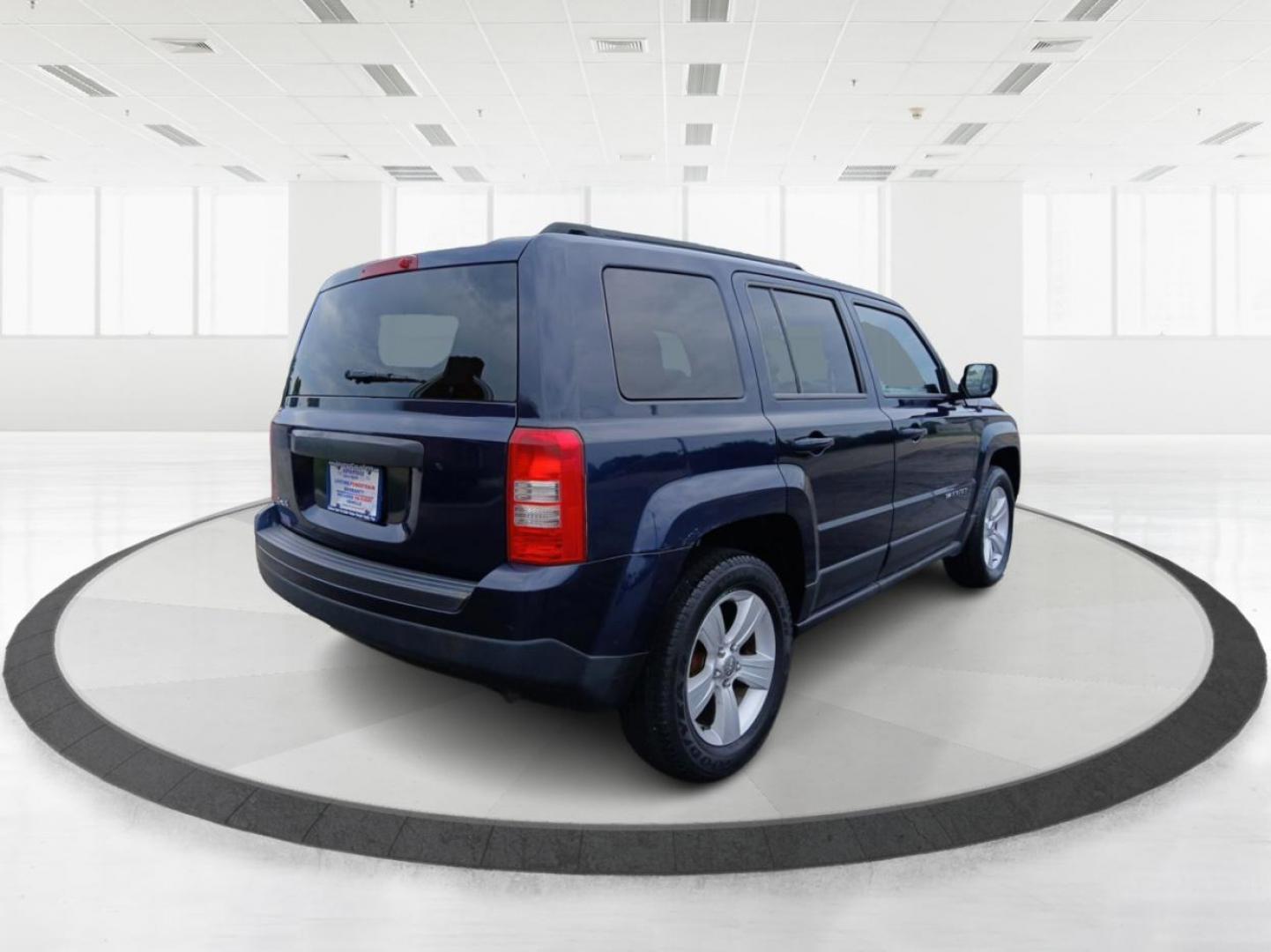 2014 True Blue Pearlcoat Jeep Patriot (1C4NJRBB3ED) with an 2.4L L4 DOHC 16V engine, located at 4508 South Dixie Dr, Moraine, OH, 45439, (937) 908-9800, 39.689976, -84.218452 - Photo#2