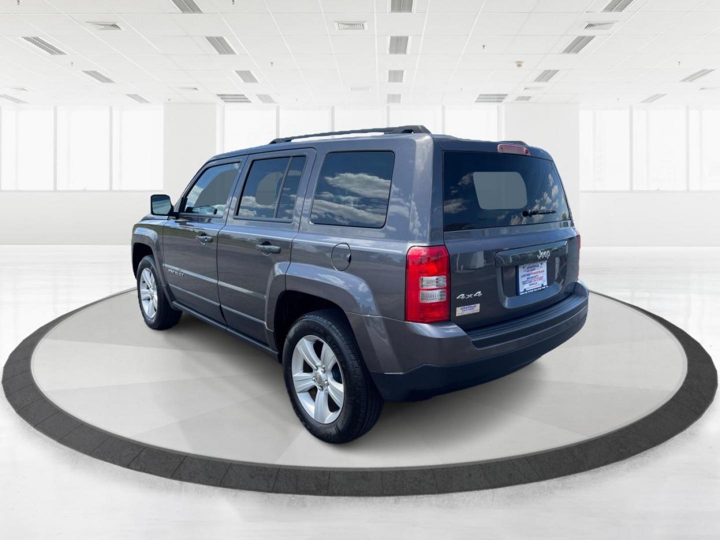 2014 Granite Crystal Met CC Jeep Patriot Sport 4WD (1C4NJRBB8ED) with an 2.4L L4 DOHC 16V engine, located at 401 Woodman Dr, Riverside, OH, 45431, (937) 908-9800, 39.760899, -84.123421 - Photo#4