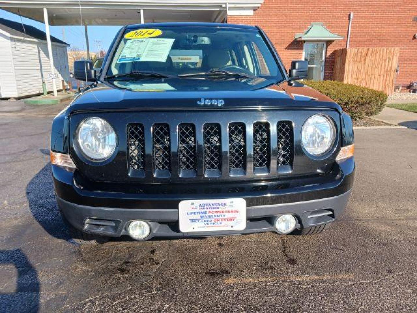 2014 Black Clearcoat Jeep Patriot Latitude 4WD (1C4NJRFB8ED) with an 2.4L L4 DOHC 16V engine, located at 401 Woodman Dr, Riverside, OH, 45431, (937) 908-9800, 39.760899, -84.123421 - Photo#1