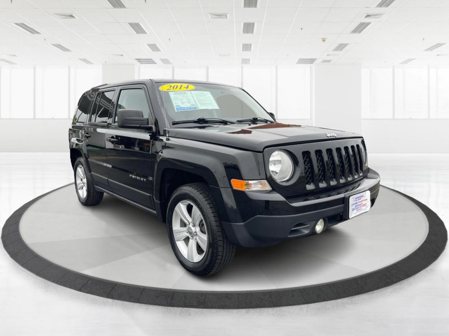 2014 Black Clearcoat Jeep Patriot Latitude 4WD (1C4NJRFB1ED) with an 2.4L L4 DOHC 16V engine, located at 880 E. National Road, Vandalia, OH, 45377, (937) 908-9800, 39.891918, -84.183594 - Photo#0