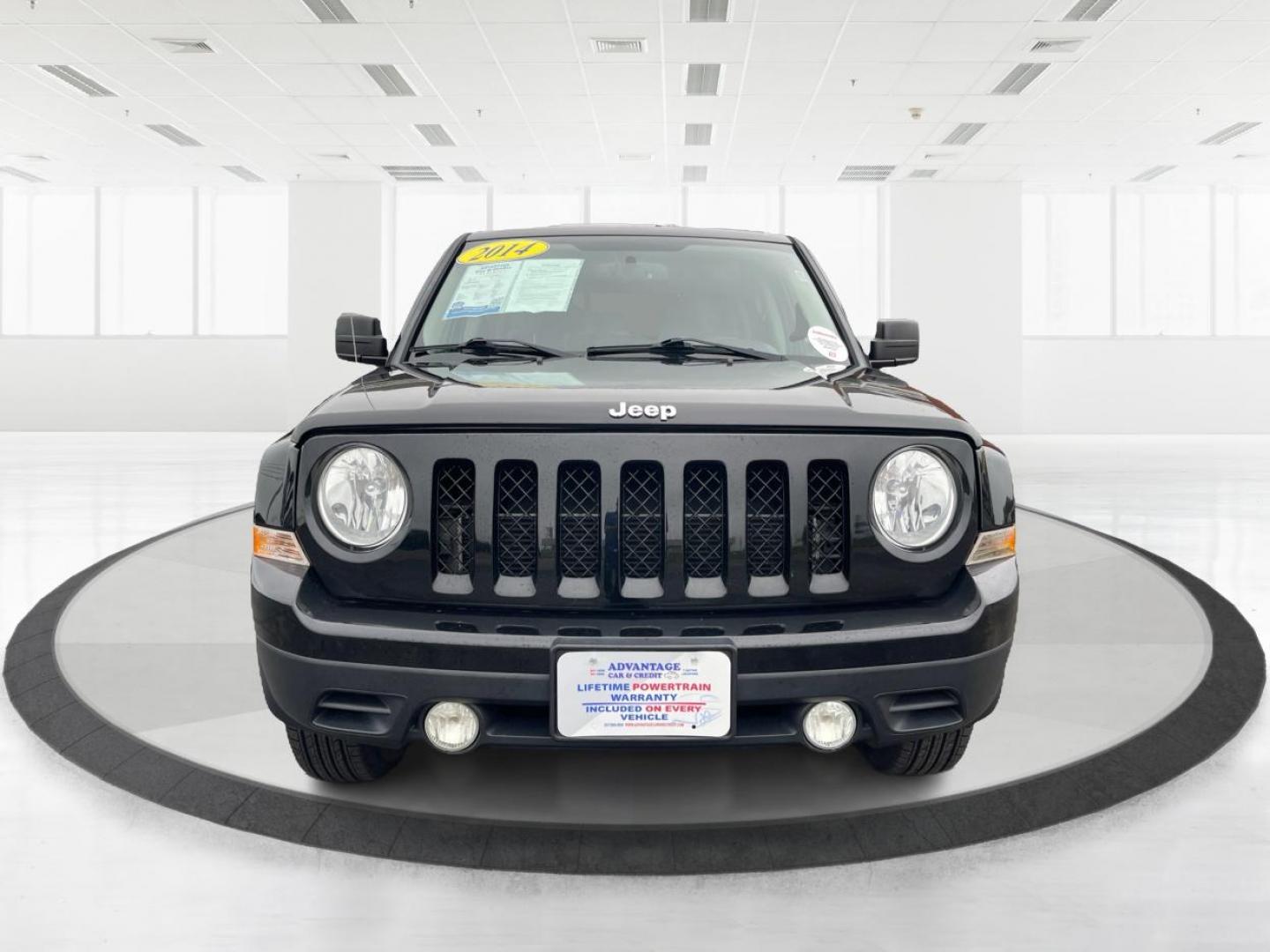 2014 Black Clearcoat Jeep Patriot Latitude 4WD (1C4NJRFB1ED) with an 2.4L L4 DOHC 16V engine, located at 880 E. National Road, Vandalia, OH, 45377, (937) 908-9800, 39.891918, -84.183594 - Photo#6