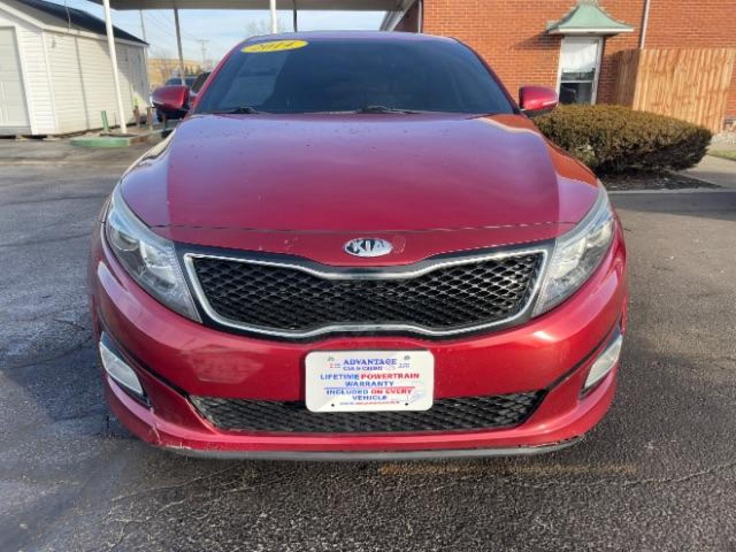 2014 Remington Red Metallic Kia Optima LX (5XXGM4A72EG) with an 2.4L L4 DOHC 16V engine, 6-Speed Automatic transmission, located at 401 Woodman Dr, Riverside, OH, 45431, (937) 908-9800, 39.760899, -84.123421 - Photo#2