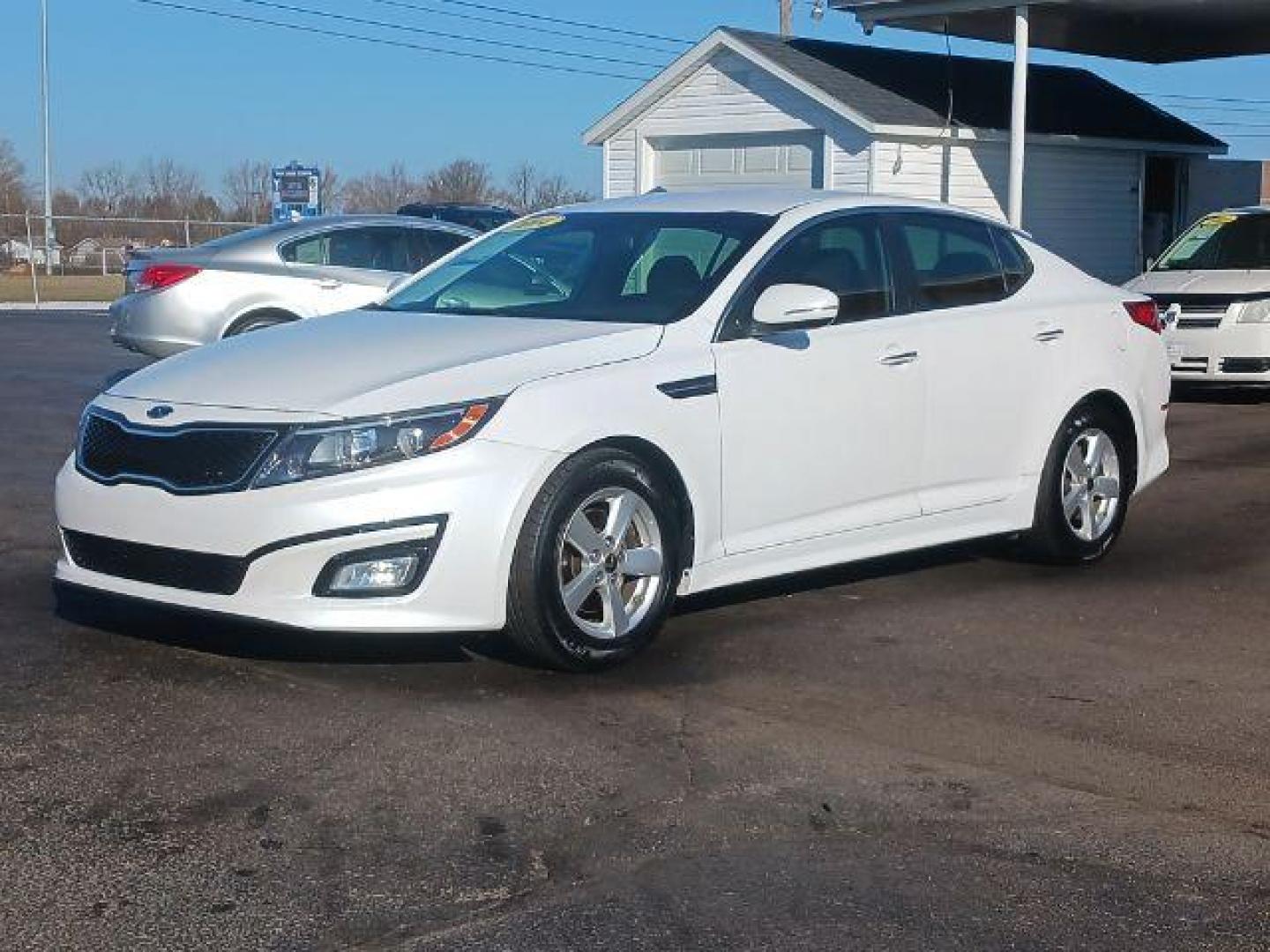 2014 Snow White Pearl Kia Optima LX (5XXGM4A71EG) with an 2.4L L4 DOHC 16V engine, 6-Speed Automatic transmission, located at 1099 N County Rd 25A, Troy, OH, 45373, (937) 908-9800, 40.057079, -84.212883 - Photo#2