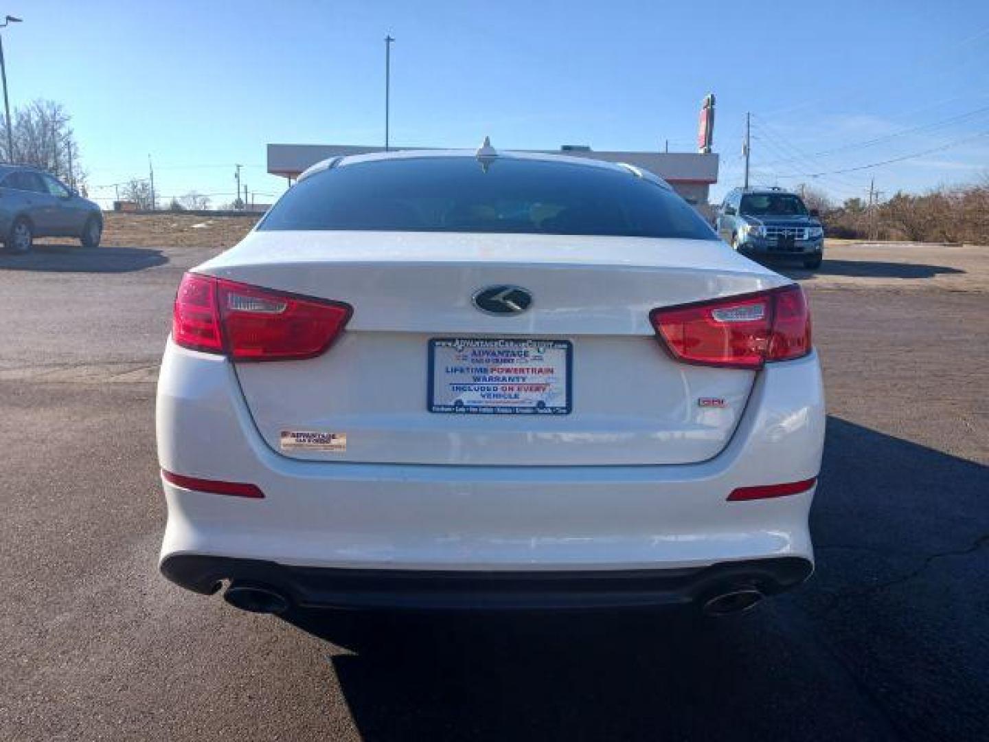 2014 Snow White Pearl Kia Optima LX (5XXGM4A71EG) with an 2.4L L4 DOHC 16V engine, 6-Speed Automatic transmission, located at 1099 N County Rd 25A, Troy, OH, 45373, (937) 908-9800, 40.057079, -84.212883 - Photo#5