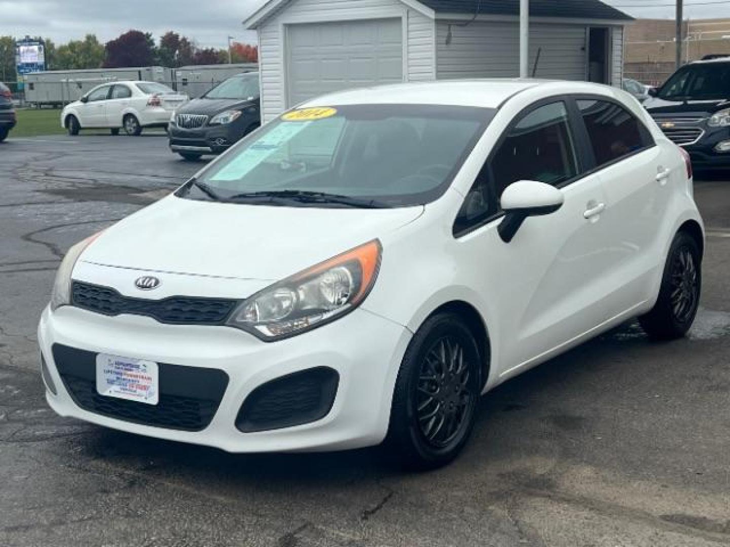 2014 Clear White Kia Rio5 LX (KNADM5A31E6) with an 1.6L L4 DOHC 16V engine, located at 880 E. National Road, Vandalia, OH, 45377, (937) 908-9800, 39.891918, -84.183594 - Photo#2