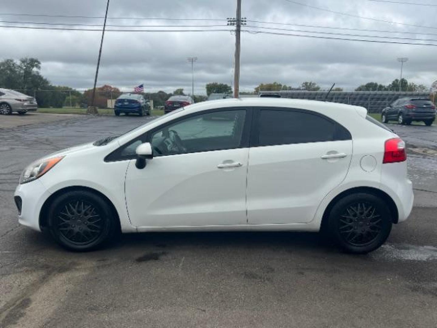 2014 Clear White Kia Rio5 LX (KNADM5A31E6) with an 1.6L L4 DOHC 16V engine, located at 880 E. National Road, Vandalia, OH, 45377, (937) 908-9800, 39.891918, -84.183594 - Photo#3