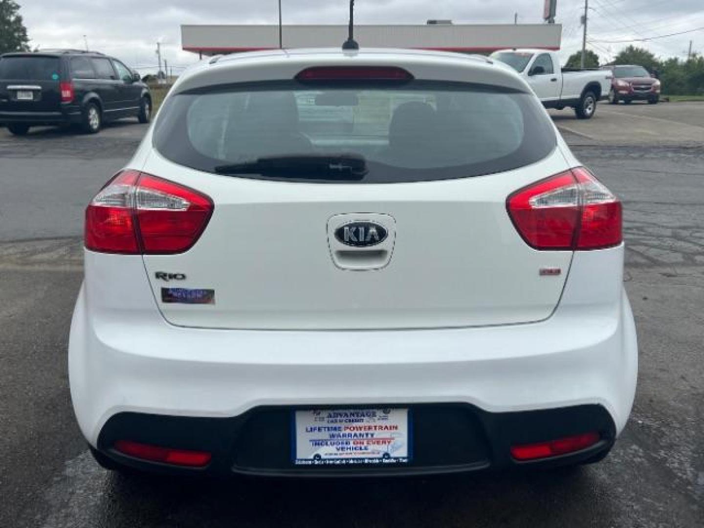 2014 Clear White Kia Rio5 LX (KNADM5A31E6) with an 1.6L L4 DOHC 16V engine, located at 880 E. National Road, Vandalia, OH, 45377, (937) 908-9800, 39.891918, -84.183594 - Photo#4