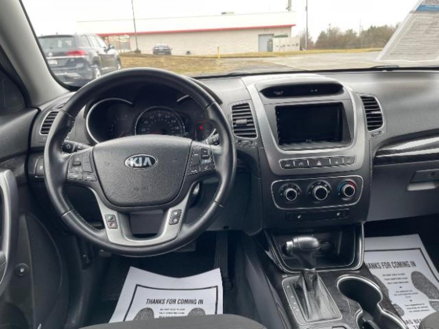 2014 Blue Kia Sorento LX 2WD (5XYKT3A64EG) with an 2.4L L4 DOHC 16V engine, 6-Speed Automatic transmission, located at 1099 N County Rd 25A, Troy, OH, 45373, (937) 908-9800, 40.057079, -84.212883 - Photo#6