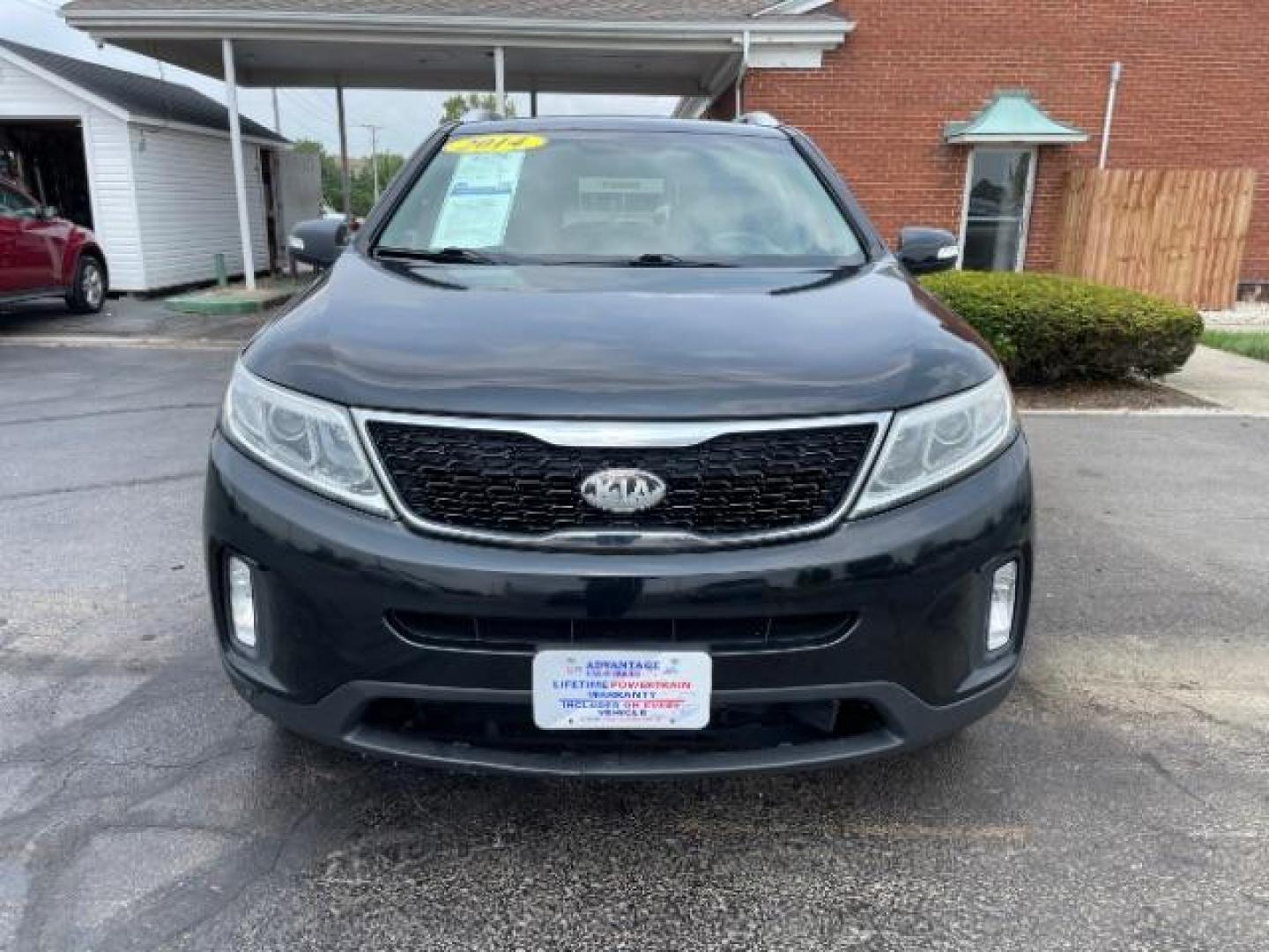 2014 Black Kia Sorento LX AWD (5XYKTCA68EG) with an 2.4L L4 DOHC 16V engine, 6-Speed Automatic transmission, located at 1951 S Dayton Lakeview Rd., New Carlisle, OH, 45344, (937) 908-9800, 39.890999, -84.050255 - Photo#1