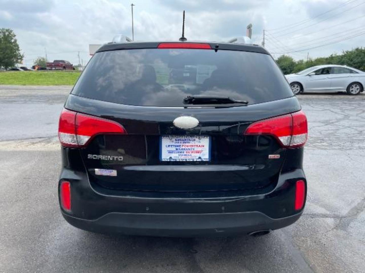 2014 Black Kia Sorento LX AWD (5XYKTCA68EG) with an 2.4L L4 DOHC 16V engine, 6-Speed Automatic transmission, located at 1951 S Dayton Lakeview Rd., New Carlisle, OH, 45344, (937) 908-9800, 39.890999, -84.050255 - Photo#4