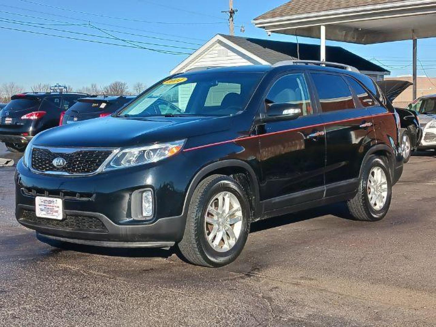 2014 Black Kia Sorento LX 2WD (5XYKT4A60EG) with an 2.4L L4 DOHC 16V engine, 6-Speed Automatic transmission, located at 1951 S Dayton Lakeview Rd., New Carlisle, OH, 45344, (937) 908-9800, 39.890999, -84.050255 - Photo#2