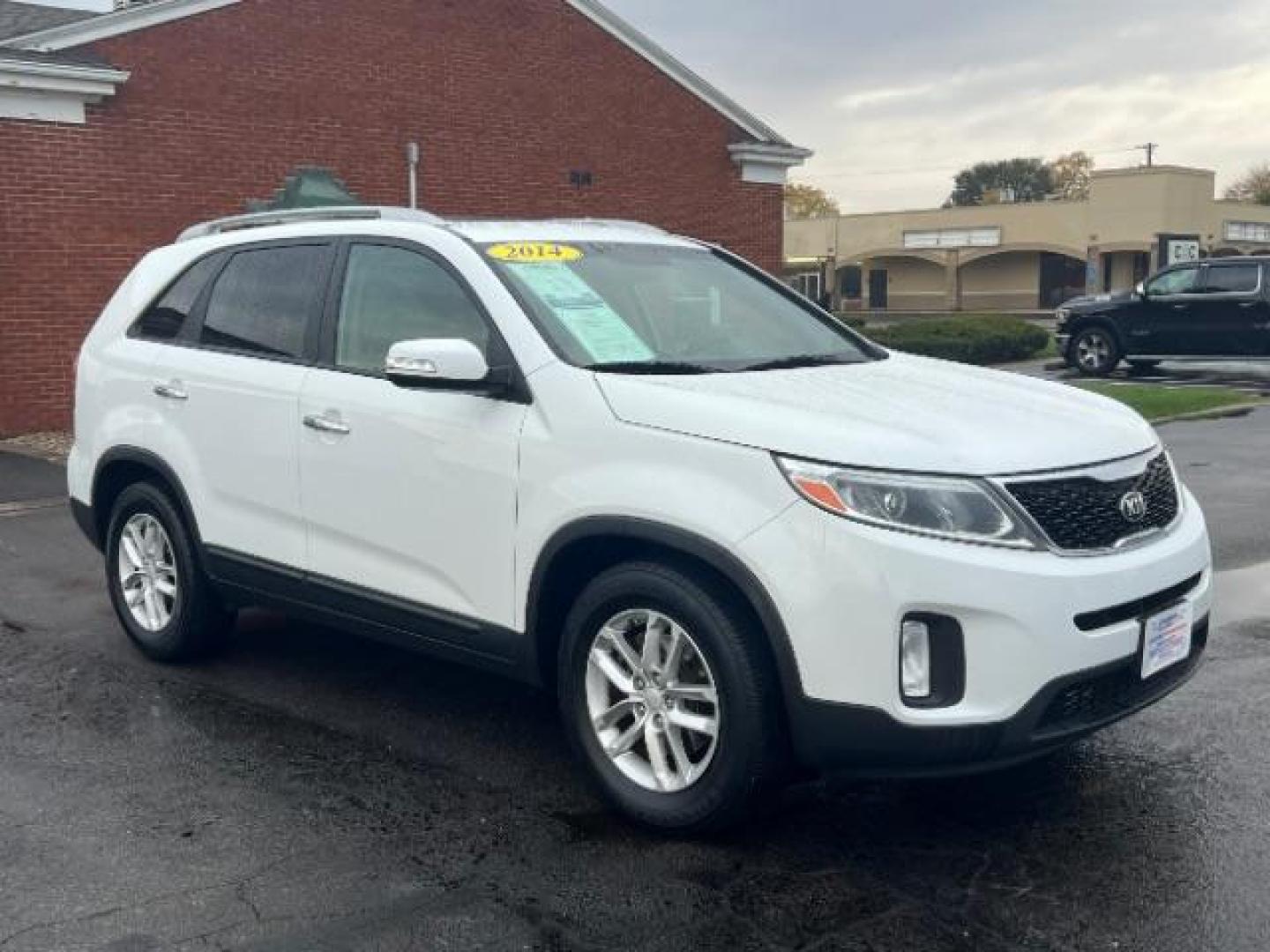 2014 White Kia Sorento LX 2WD (5XYKT3A68EG) with an 2.4L L4 DOHC 16V engine, 6-Speed Automatic transmission, located at 1099 N County Rd 25A, Troy, OH, 45373, (937) 908-9800, 40.057079, -84.212883 - Photo#0