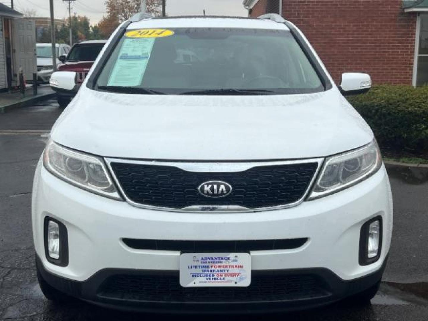 2014 White Kia Sorento LX 2WD (5XYKT3A68EG) with an 2.4L L4 DOHC 16V engine, 6-Speed Automatic transmission, located at 1099 N County Rd 25A, Troy, OH, 45373, (937) 908-9800, 40.057079, -84.212883 - Photo#1