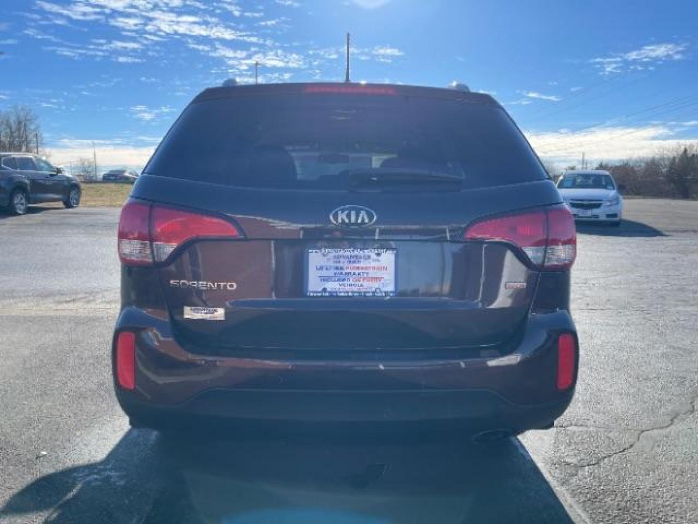 2014 Maroon Kia Sorento LX 2WD (5XYKT3A6XEG) with an 2.4L L4 DOHC 16V engine, 6-Speed Automatic transmission, located at 4508 South Dixie Dr, Moraine, OH, 45439, (937) 908-9800, 39.689976, -84.218452 - Photo#4