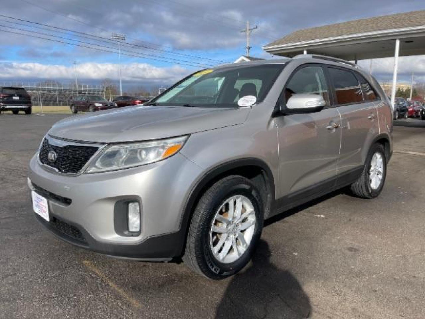 2014 Silver Kia Sorento LX 2WD (5XYKT4A64EG) with an 2.4L L4 DOHC 16V engine, 6-Speed Automatic transmission, located at 880 E. National Road, Vandalia, OH, 45377, (937) 908-9800, 39.891918, -84.183594 - Photo#1