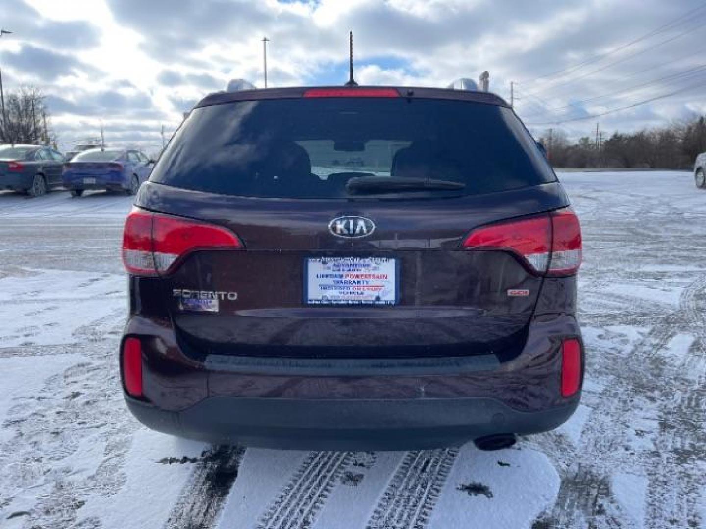 2014 Dark Cherry Kia Sorento LX AWD (5XYKTCA63EG) with an 2.4L L4 DOHC 16V engine, 6-Speed Automatic transmission, located at 1230 East Main St, Xenia, OH, 45385, (937) 908-9800, 39.688026, -83.910172 - Photo#4