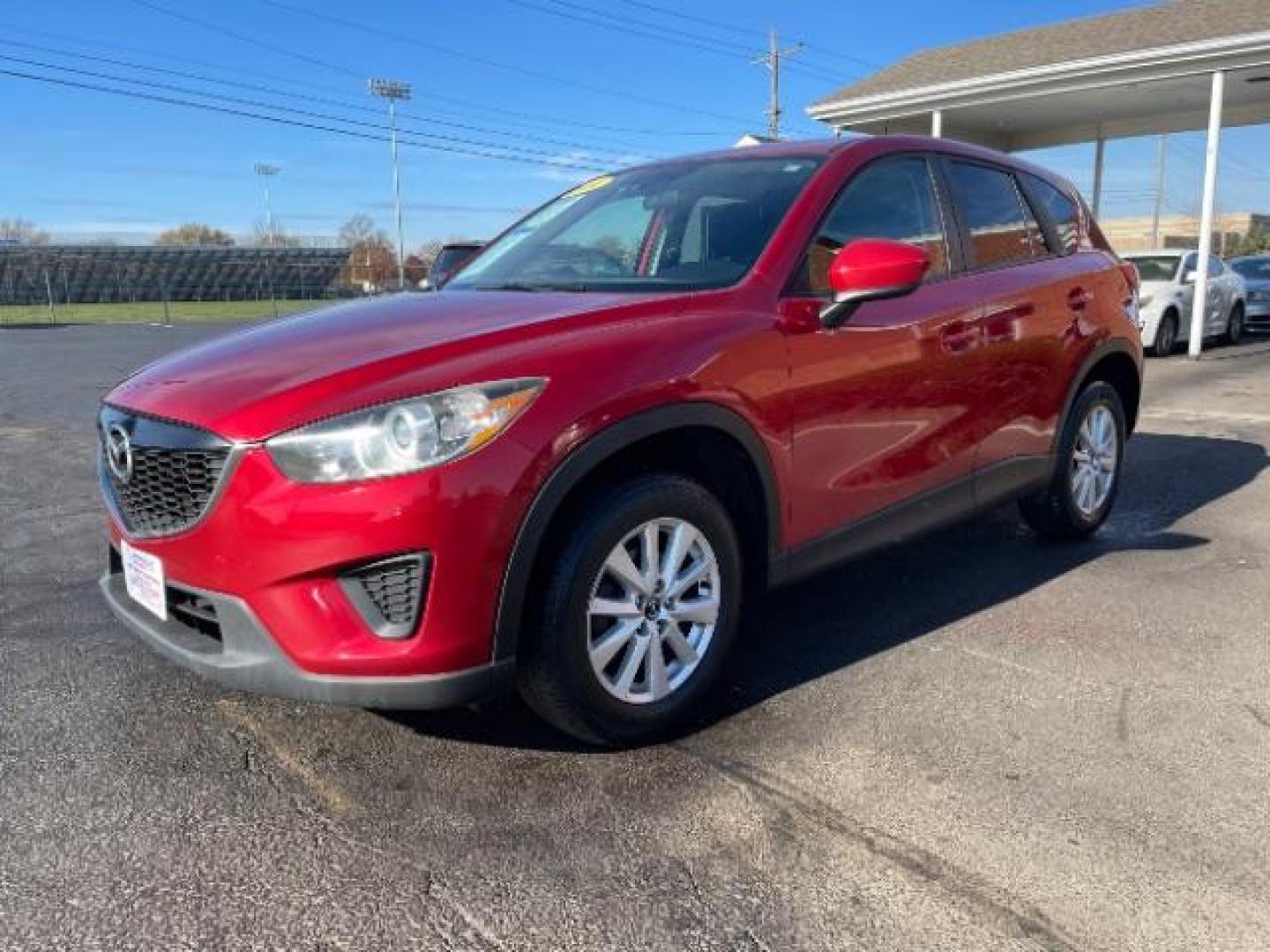 2014 Soul Red Metallic Mazda CX-5 Sport AT (JM3KE2BE7E0) with an 2.0L L4 DOHC 16V engine, 6-Speed Automatic transmission, located at 1230 East Main St, Xenia, OH, 45385, (937) 908-9800, 39.688026, -83.910172 - Photo#1