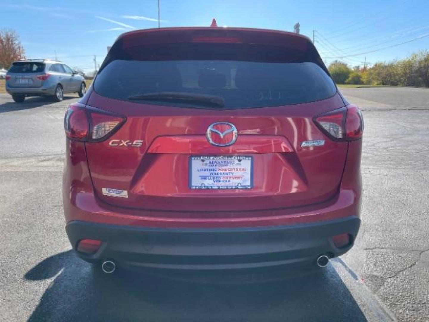 2014 Soul Red Metallic Mazda CX-5 Sport AT (JM3KE2BE7E0) with an 2.0L L4 DOHC 16V engine, 6-Speed Automatic transmission, located at 1230 East Main St, Xenia, OH, 45385, (937) 908-9800, 39.688026, -83.910172 - Photo#3