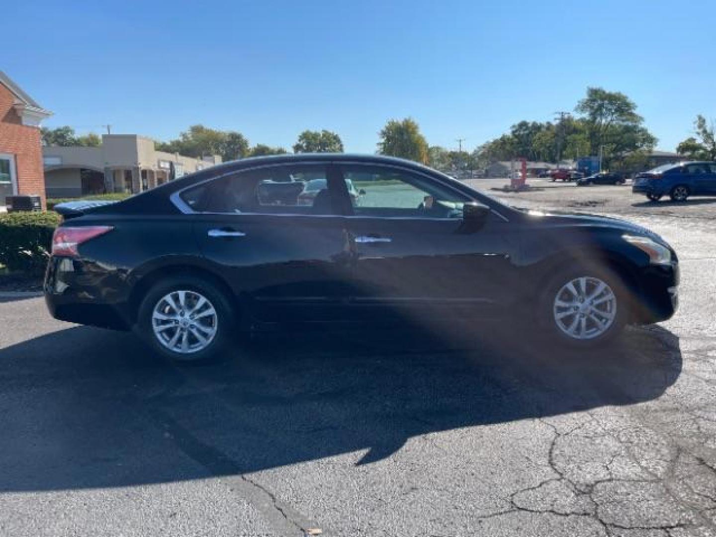 2014 Super Black Nissan Altima 2.5 S (1N4AL3AP9EC) with an 2.5L L4 DOHC 16V engine, Continuously Variable Transmission transmission, located at 880 E. National Road, Vandalia, OH, 45377, (937) 908-9800, 39.891918, -84.183594 - Photo#3