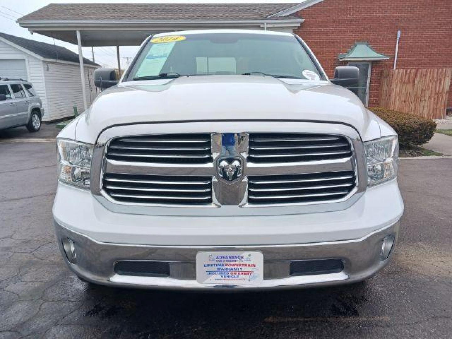 2014 Bright White Clearcoat RAM 1500 SLT Quad Cab 4WD (1C6RR7GT9ES) with an 5.7L V8 OHV 16V engine, 8-Speed Automatic transmission, located at 1099 N County Rd 25A, Troy, OH, 45373, (937) 908-9800, 40.057079, -84.212883 - Photo#1