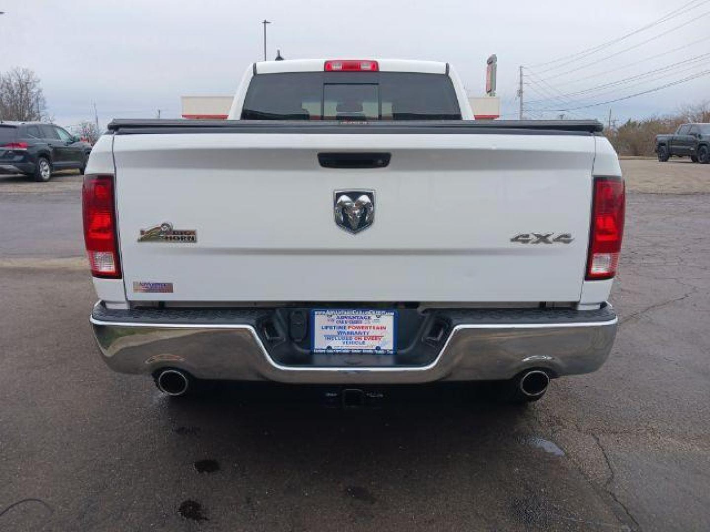 2014 Bright White Clearcoat RAM 1500 SLT Quad Cab 4WD (1C6RR7GT9ES) with an 5.7L V8 OHV 16V engine, 8-Speed Automatic transmission, located at 1099 N County Rd 25A, Troy, OH, 45373, (937) 908-9800, 40.057079, -84.212883 - Photo#5