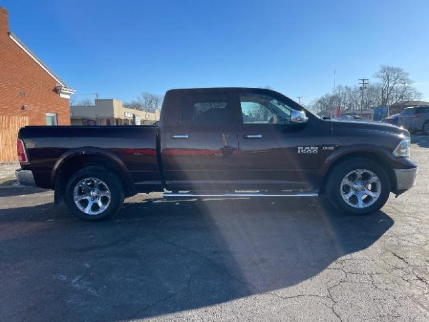 2014 Western Brown RAM 1500 Laramie Crew Cab LWB 4WD (1C6RR7VT1ES) with an 5.7L V8 OHV 16V engine, 8-Speed Automatic transmission, located at 1951 S Dayton Lakeview Rd., New Carlisle, OH, 45344, (937) 908-9800, 39.890999, -84.050255 - Photo#3