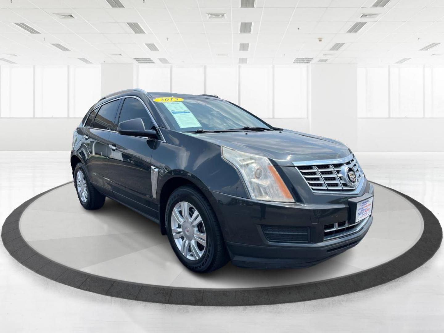 2015 Graphite Metallic Cadillac SRX Luxury Collection AWD (3GYFNEE31FS) with an 3.6L V6 DOHC 24V FFV engine, 6-Speed Automatic transmission, located at 1951 S Dayton Lakeview Rd., New Carlisle, OH, 45344, (937) 908-9800, 39.890999, -84.050255 - Photo#0