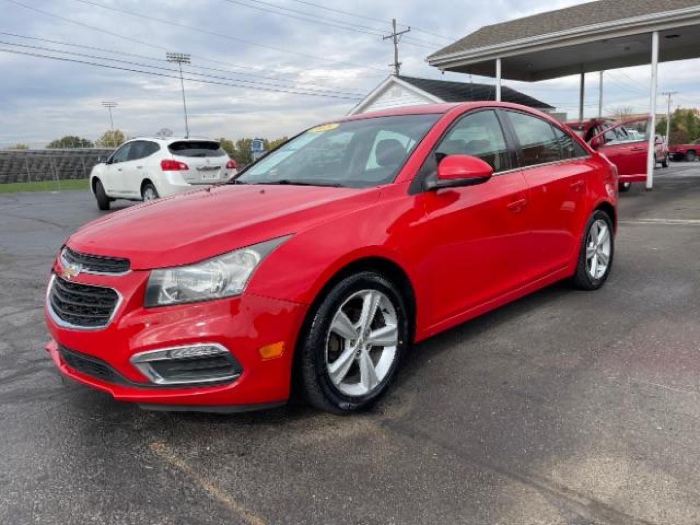 2015 Red Hot Chevrolet Cruze 2LT Auto (1G1PE5SB2F7) with an 1.4L L4 DOHC 16V TURBO engine, 6-Speed Automatic transmission, located at 1184 Kauffman Ave, Fairborn, OH, 45324, (937) 908-9800, 39.807072, -84.030914 - Photo#1