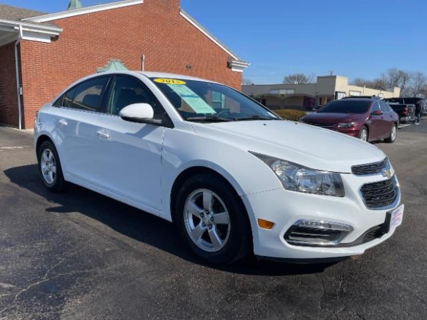 2015 Summit White Chevrolet Cruze 1LT Auto (1G1PC5SB0F7) with an 1.4L L4 DOHC 16V TURBO engine, 6-Speed Automatic transmission, located at 1951 S Dayton Lakeview Rd., New Carlisle, OH, 45344, (937) 908-9800, 39.890999, -84.050255 - Photo#0