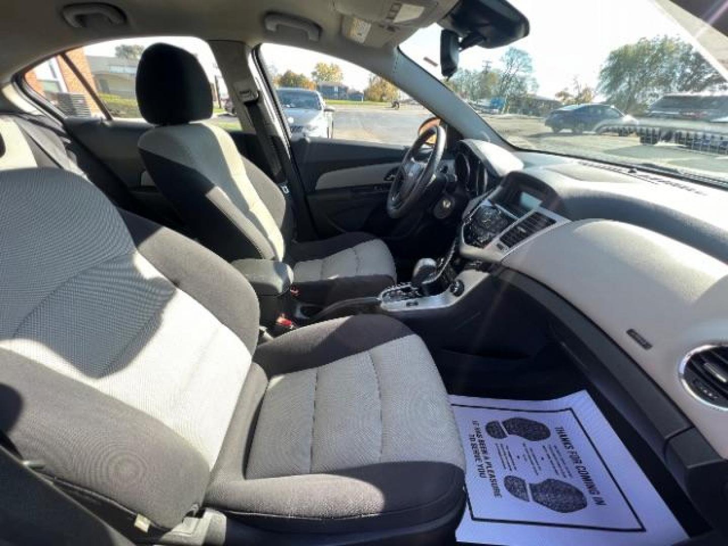 2015 Black Granite Metallic Chevrolet Cruze LS Auto (1G1PA5SHXF7) with an 1.8L L4 DOHC 16V FFV engine, 6-Speed Automatic transmission, located at 880 E. National Road, Vandalia, OH, 45377, (937) 908-9800, 39.891918, -84.183594 - Photo#9