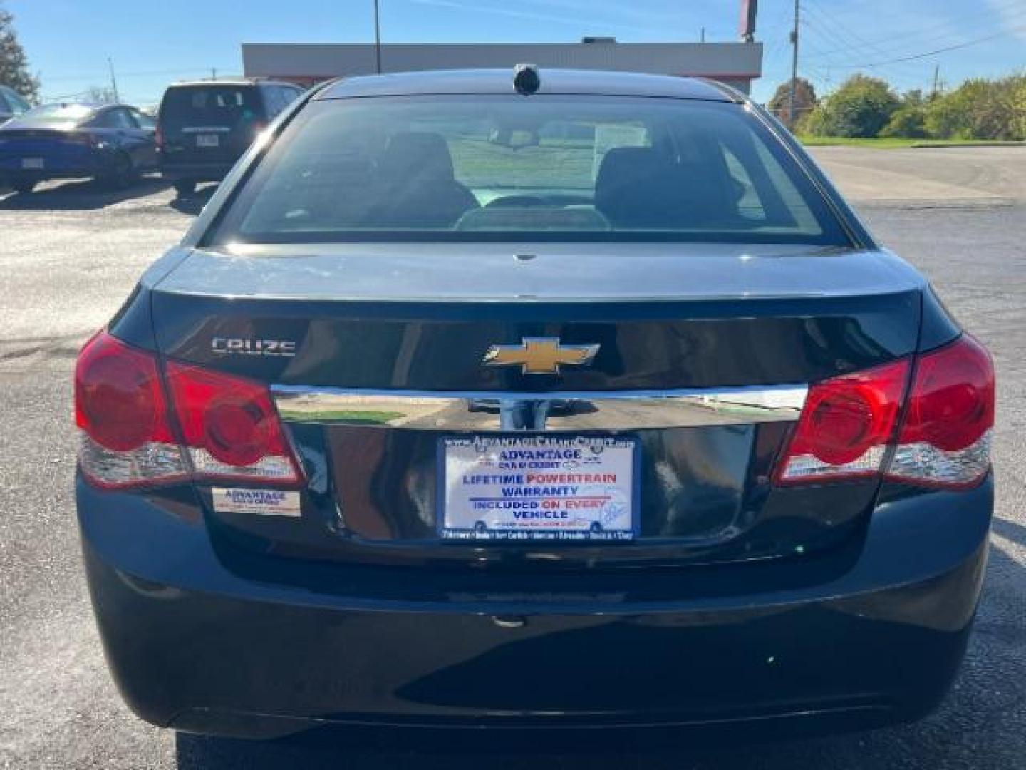 2015 Black Granite Metallic Chevrolet Cruze LS Auto (1G1PA5SHXF7) with an 1.8L L4 DOHC 16V FFV engine, 6-Speed Automatic transmission, located at 880 E. National Road, Vandalia, OH, 45377, (937) 908-9800, 39.891918, -84.183594 - Photo#4