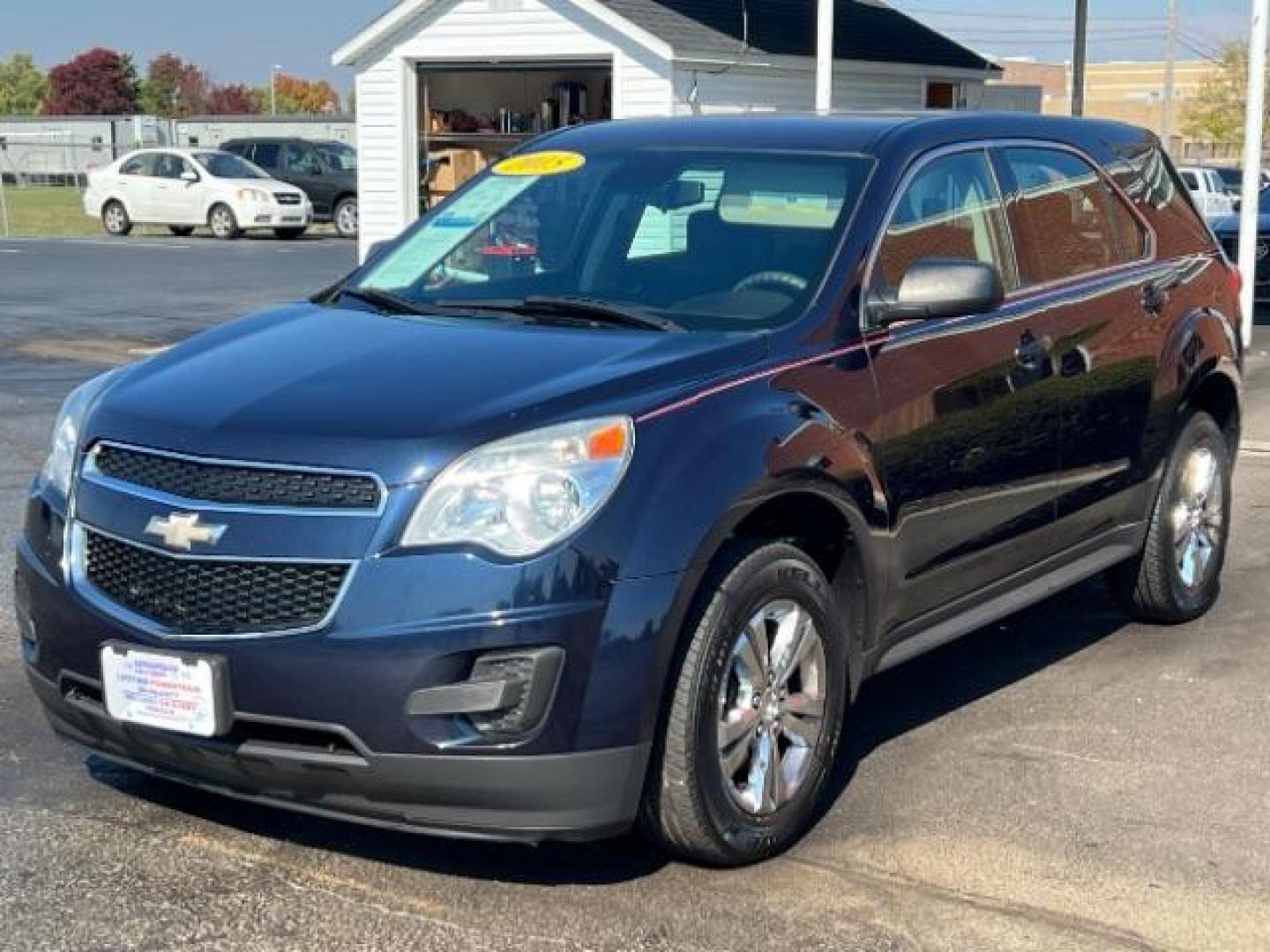 2015 Blue Velvet Metallic Chevrolet Equinox LS 2WD (2GNALAEK6F1) with an 2.4L L4 DOHC 16V FFV engine, 6-Speed Automatic transmission, located at 1099 N County Rd 25A, Troy, OH, 45373, (937) 908-9800, 40.057079, -84.212883 - Photo#2