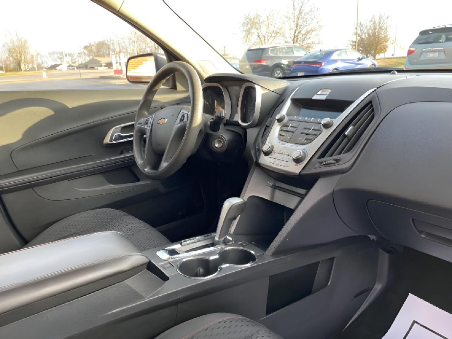 2015 Summit White Chevrolet Equinox LS 2WD (2GNALAEK4F1) with an 2.4L L4 DOHC 16V FFV engine, 6-Speed Automatic transmission, located at 1184 Kauffman Ave, Fairborn, OH, 45324, (937) 908-9800, 39.807072, -84.030914 - Photo#9