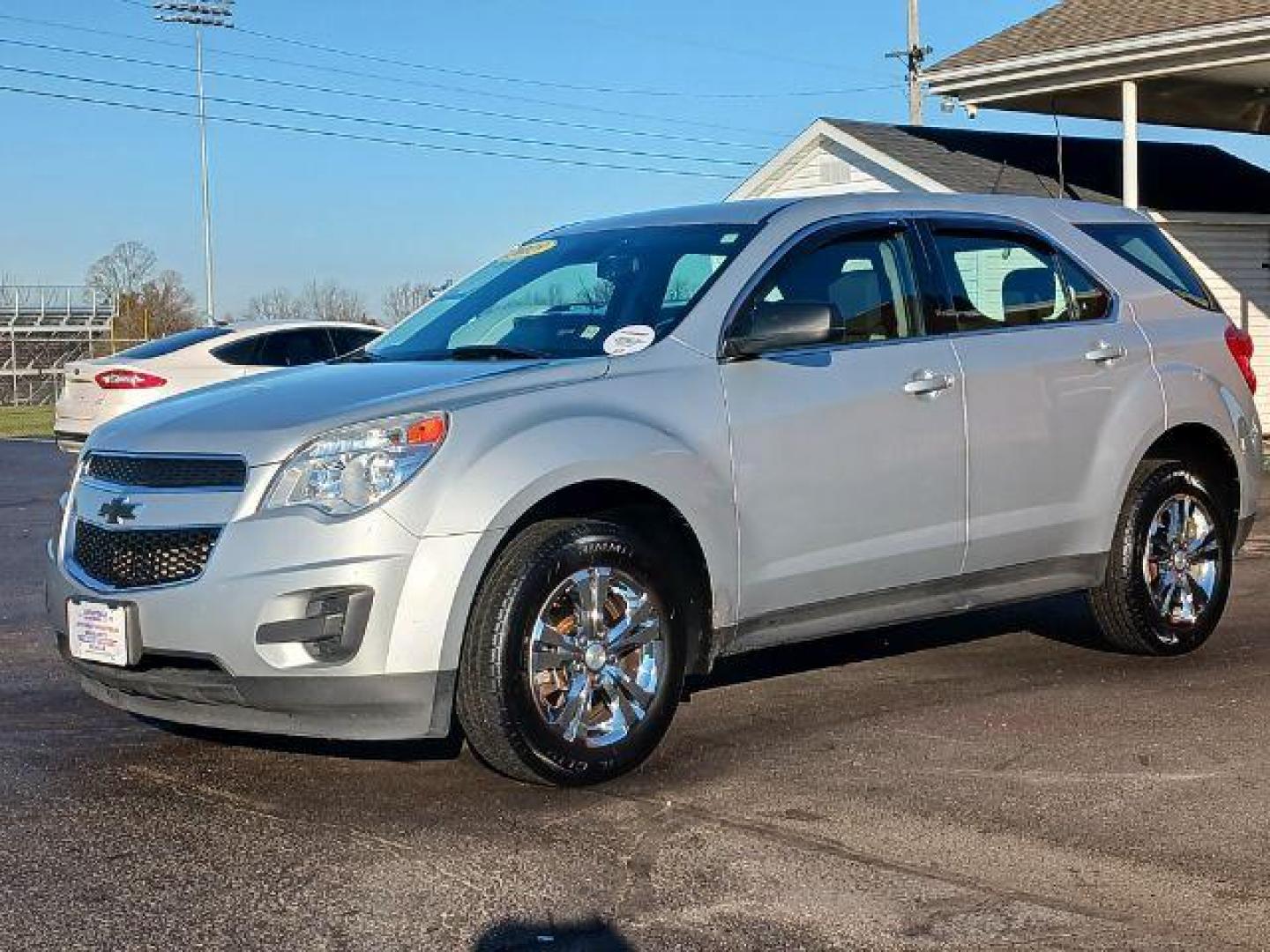 2015 Champagne Silver Metallic Chevrolet Equinox LS AWD (2GNFLEEK6F6) with an 2.4L L4 DOHC 16V FFV engine, 6-Speed Automatic transmission, located at 1184 Kauffman Ave, Fairborn, OH, 45324, (937) 908-9800, 39.807072, -84.030914 - Photo#2