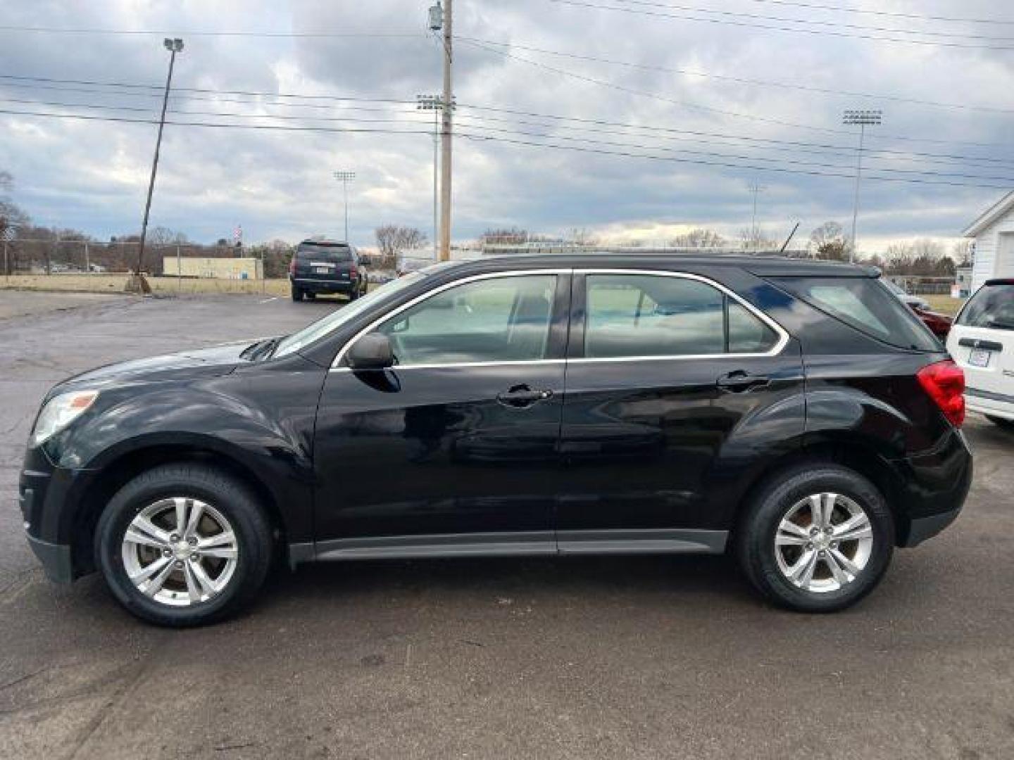 2015 Black Chevrolet Equinox LS 2WD (2GNALAEK7F1) with an 2.4L L4 DOHC 16V FFV engine, 6-Speed Automatic transmission, located at 4508 South Dixie Dr, Moraine, OH, 45439, (937) 908-9800, 39.689976, -84.218452 - Photo#3