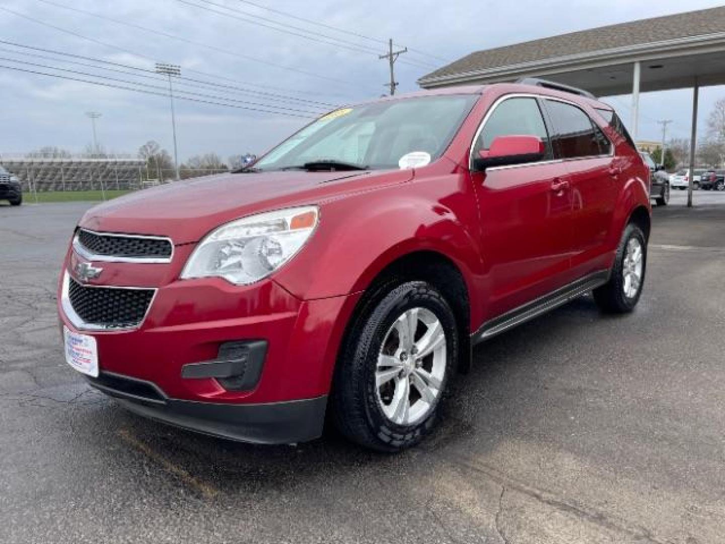 2015 Crystal Red Tintcoat Chevrolet Equinox 1LT AWD (2GNFLFEK3F6) with an 2.4L L4 DOHC 16V FFV engine, 6-Speed Automatic transmission, located at 1230 East Main St, Xenia, OH, 45385, (937) 908-9800, 39.688026, -83.910172 - Photo#2